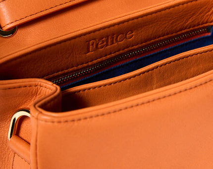 Oranje tas van leer – 3 geheime tips hoe te stylen